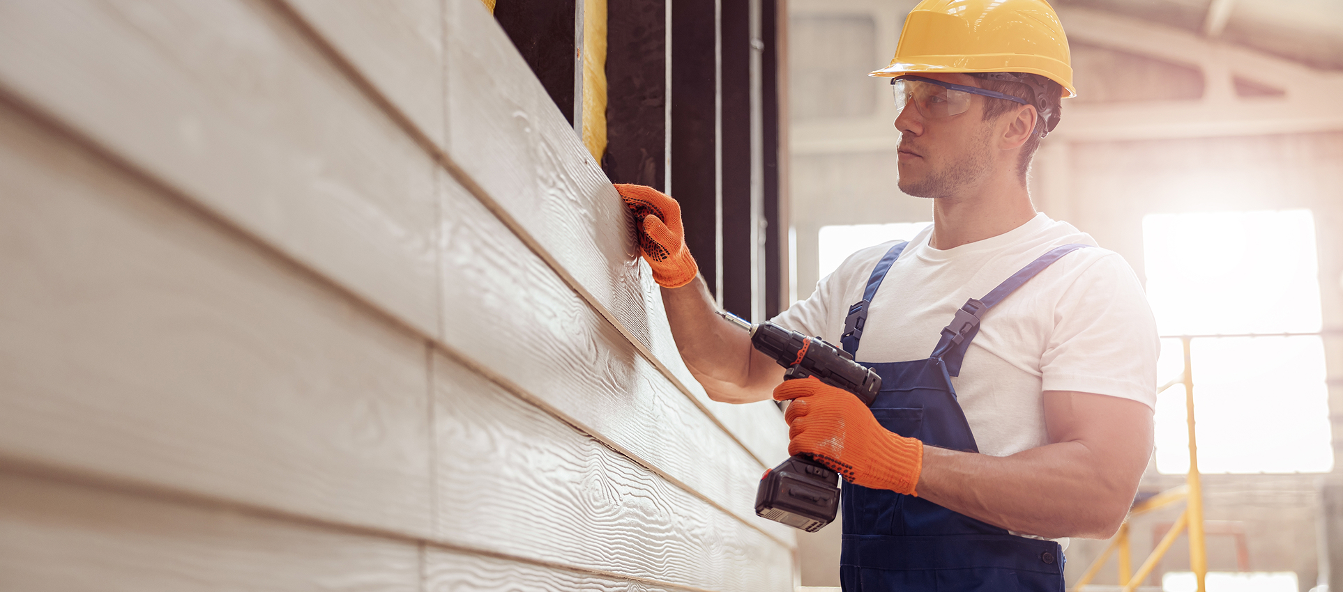 Worker Installing Fiber Cement Siding