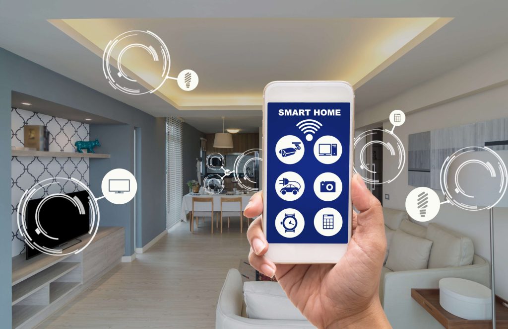 Smart Home Technology Being Controlled on a Smartphone Managing Lighting Temperature and Security Remotely