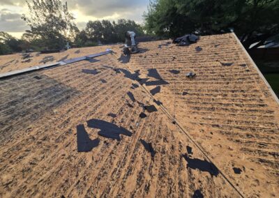 Old Roof Torn off Down to the Deck on a Katy Home
