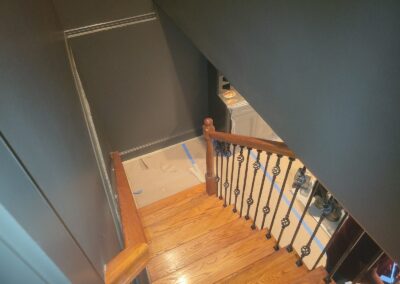 Refinished Stair Landing with Green Accent Wall