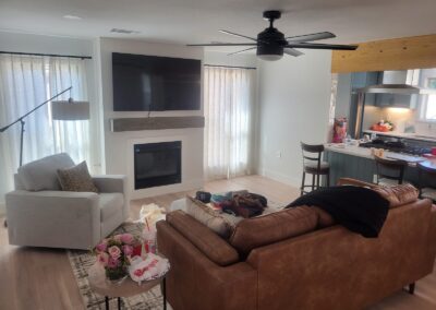 Living Room with New Fireplace Beam and Flooring