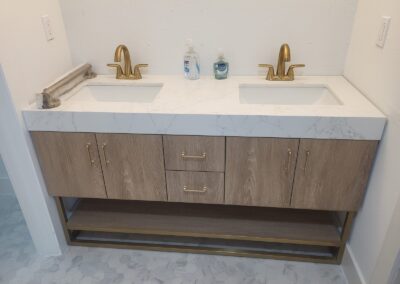 Double Vanity with Brass Fixtures