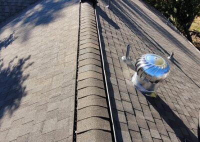 Finished Roof with a Ridge Vent on a Humble Home